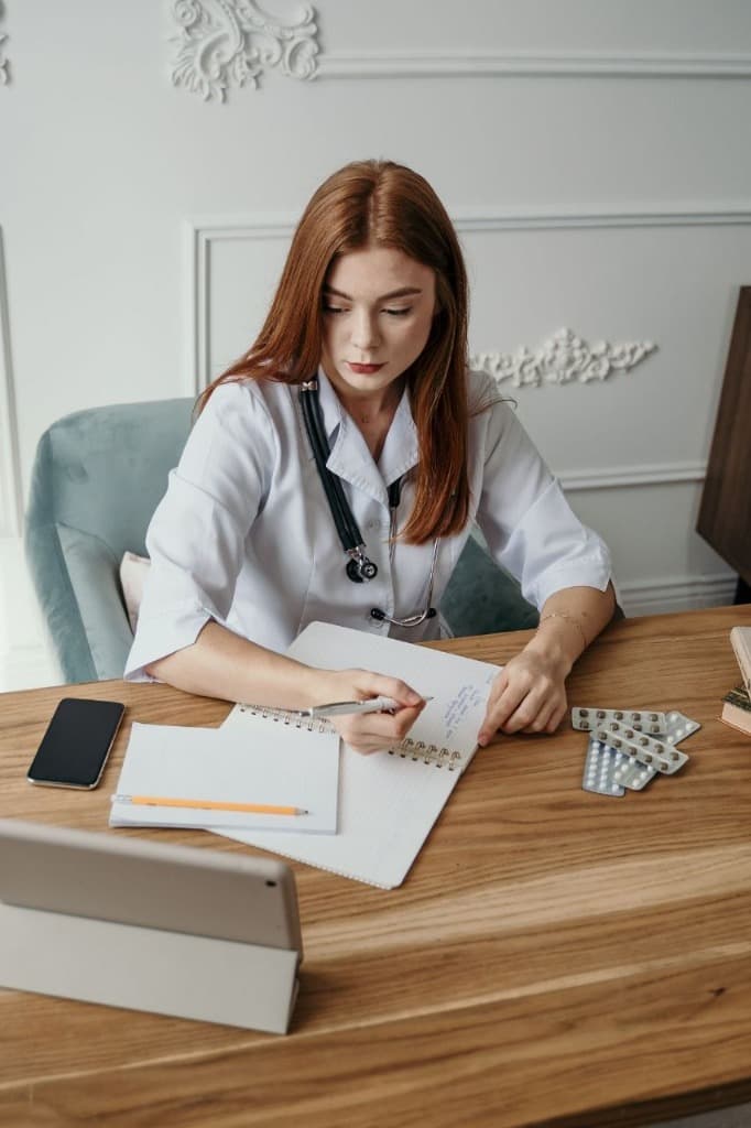 Doctor writing notes